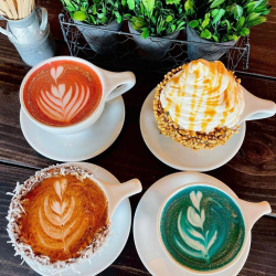 Coffee Lattes with designs or whipped cream
